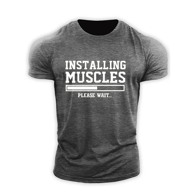 "INSTALLING MUSCLES" Men's T-shirt